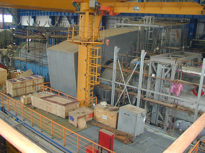 Installation work on plant components inside the power station.